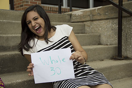 Laughing with excitement, junior Daniela Litardo waves her ‘Whole 30’ sign. Litardo has followed the diet 4 times this year. “I usually only do [Whole 30] for 30 days because your body needs more protein,” Litardo said.