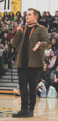 Standing in front of the student body, junior Kaysha Foil speaks about ridicule he has faced because of being different.  Foil is a member of Gay-Straight Alliance and performed a speech with his fellow members of GSA. “My freshman year I came out as gay, and I felt like I needed more of a support group other than my friends,” Foil said. “I decided to go to one of the [GSA] meetings, and I’ve been there ever since.” 