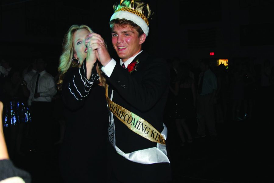 Dancing with his mom, senior Alex Totta celebrates winning Homecoming King. “It was an honor just to be nominated for it,” Totta said. “To win it made it that much more  meaningful.”