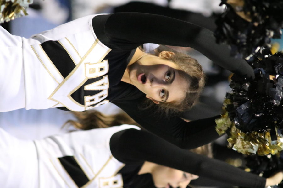 With multiple sports coming to an end and new ones starting, cheerleaders such as sophomore Kallyn Torgler have been reflecting on the season.
“My favorite part is probably either the run through where we hold up the sign or when it’s really close to the end and we figure out if they’re going to win or not in [those] last few seconds,” Torgler said.
According to Torgler, having cheerleaders at the various games is important.
“We engage the crowd,” Torgler said. “We help motivate them to be better for a team, just to give them more support.”