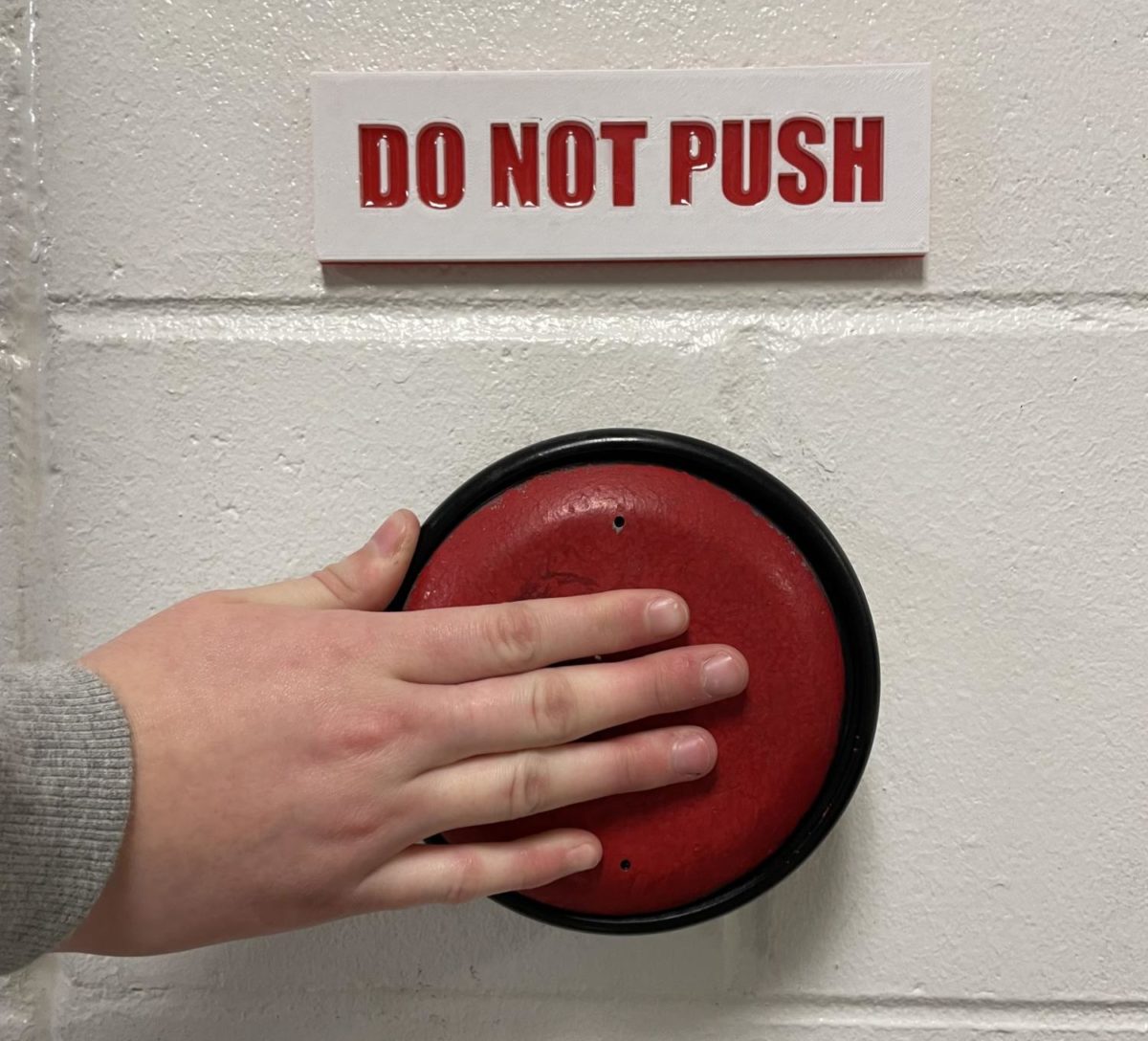 big+red+button+with+large-print%2C+bold+do+not+push+sign+over+it